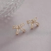 Xuhui brand exquisite and light luxury copper plated with real gold and set with zircon 925 silver needle bow, luxurious and fashionable stud earrings details Picture